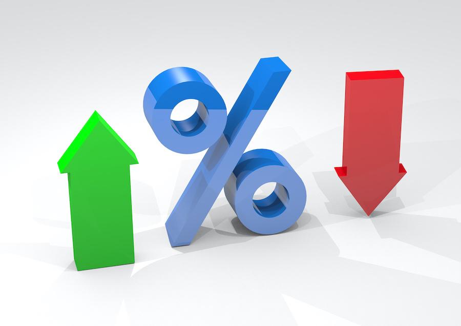 up and down arrows around an interest rate symbol