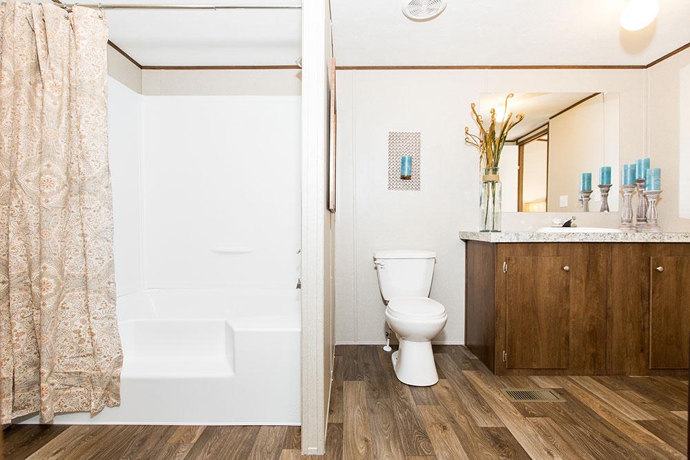 Tru Home Marvel model mobile home primary bathroom