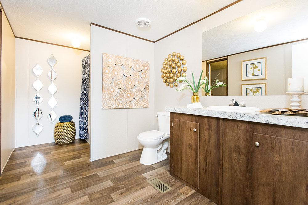 Tru Homes Wonder model mobile home primary bathroom