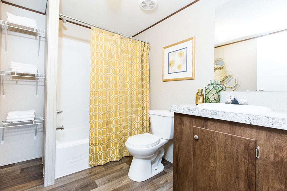 Tru Homes Wonder model mobile home primary bathroom