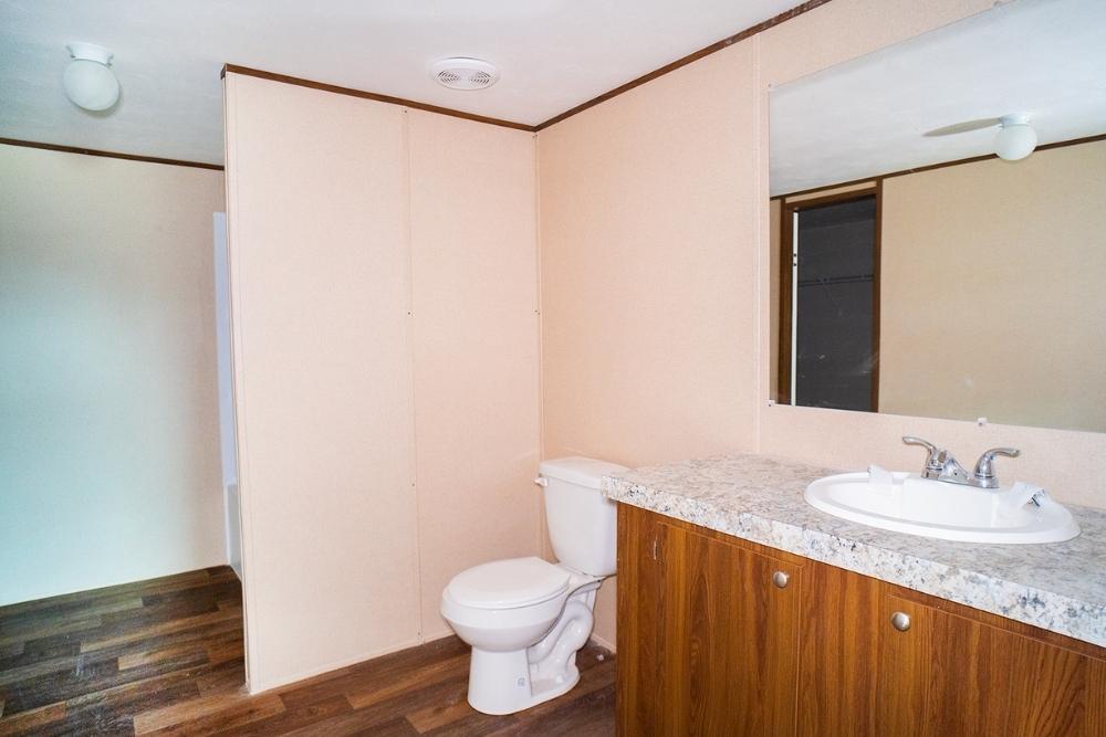 TRU Homes Double Wide Mobile Home Triumph Interior Primary Bath View 01