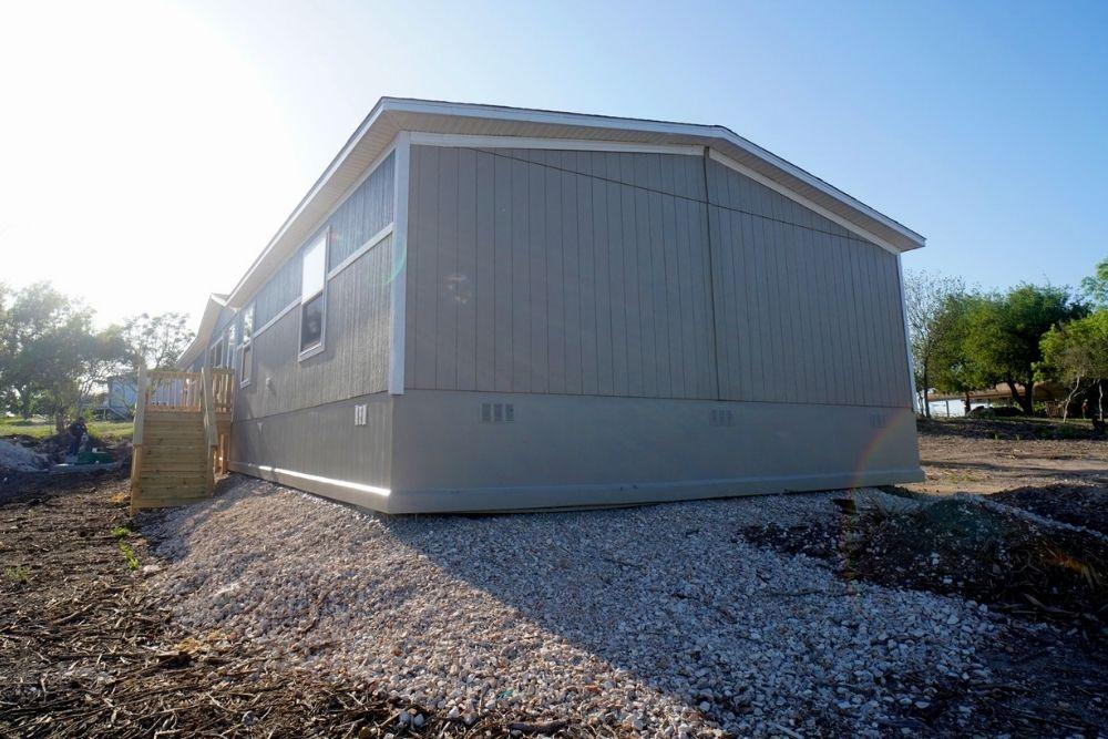 TRU Homes Double Wide Mobile Home Triumph Exterior Back View 01