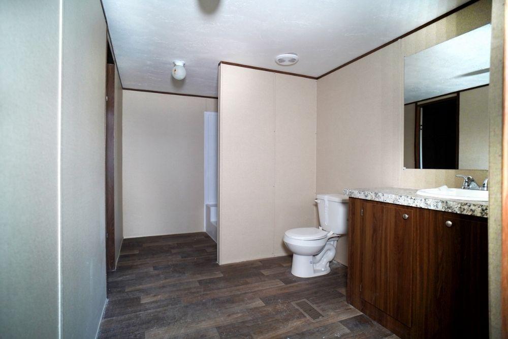 TRU Homes Double Wide Mobile Home Triumph Interior Primary Bathroom View 01