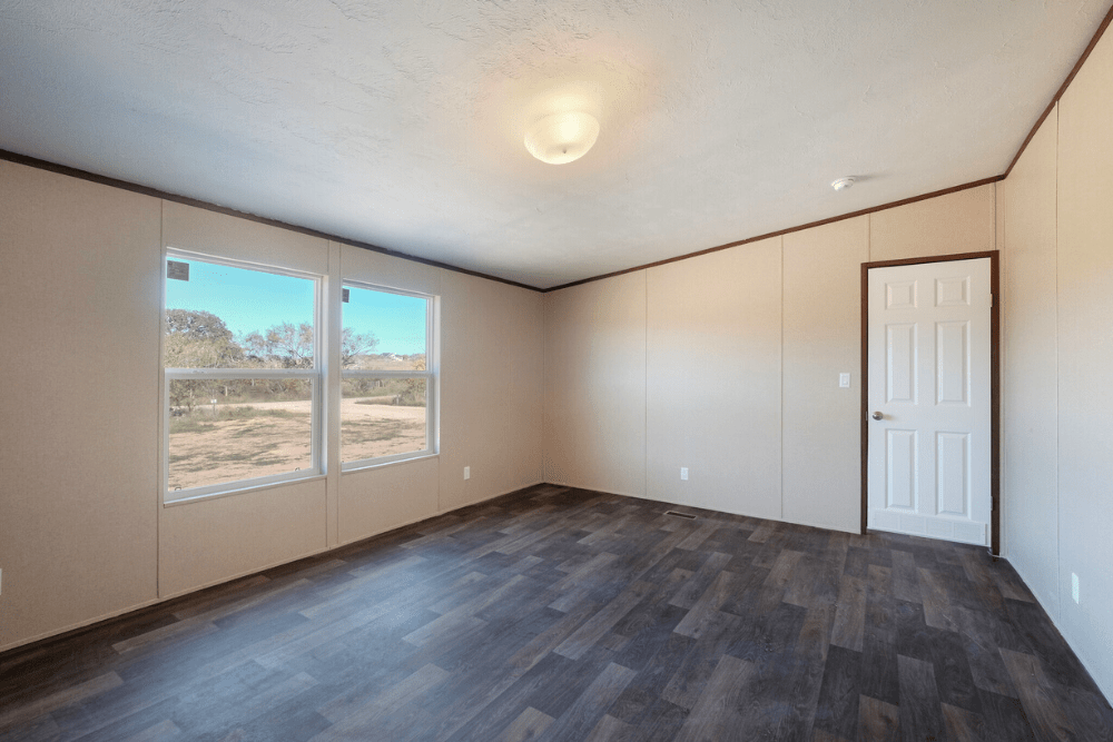 TRU Homes Model Pride Mobile Home Interior Primary Bed View 01 - 4682 Brown Rd, Poteet, TX