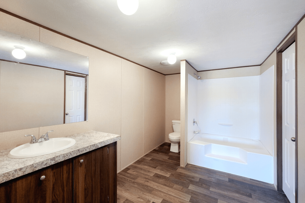 TRU Homes Model Pride Mobile Home Interior Primary Bath View 01 - 4682 Brown Rd, Poteet, TX