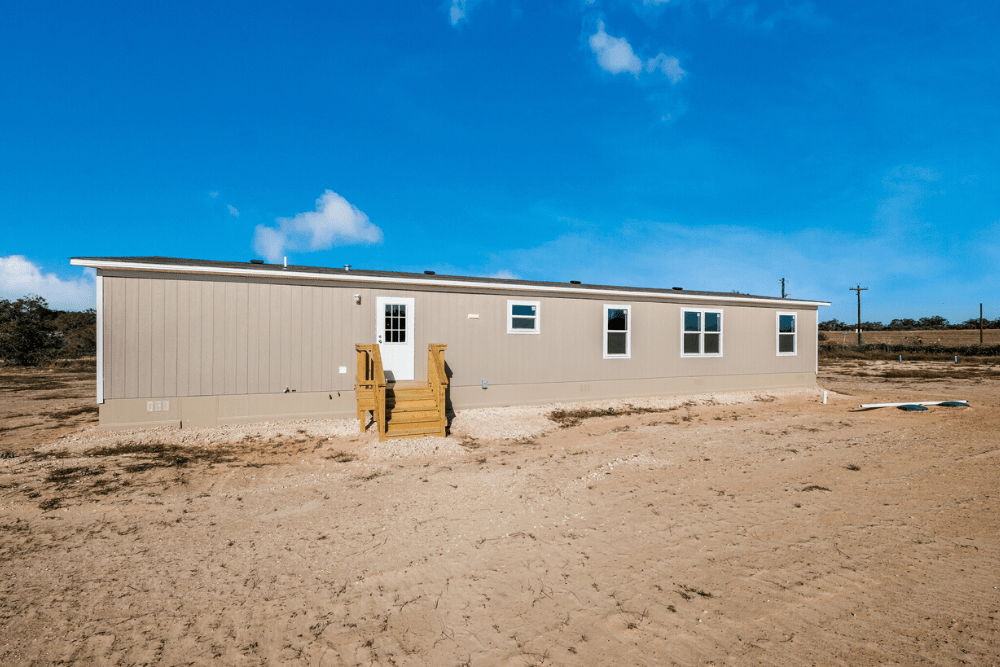 TRU Homes Model Pride Mobile Home Exterior Back View 01 - 4682 Brown Rd, Poteet, TX